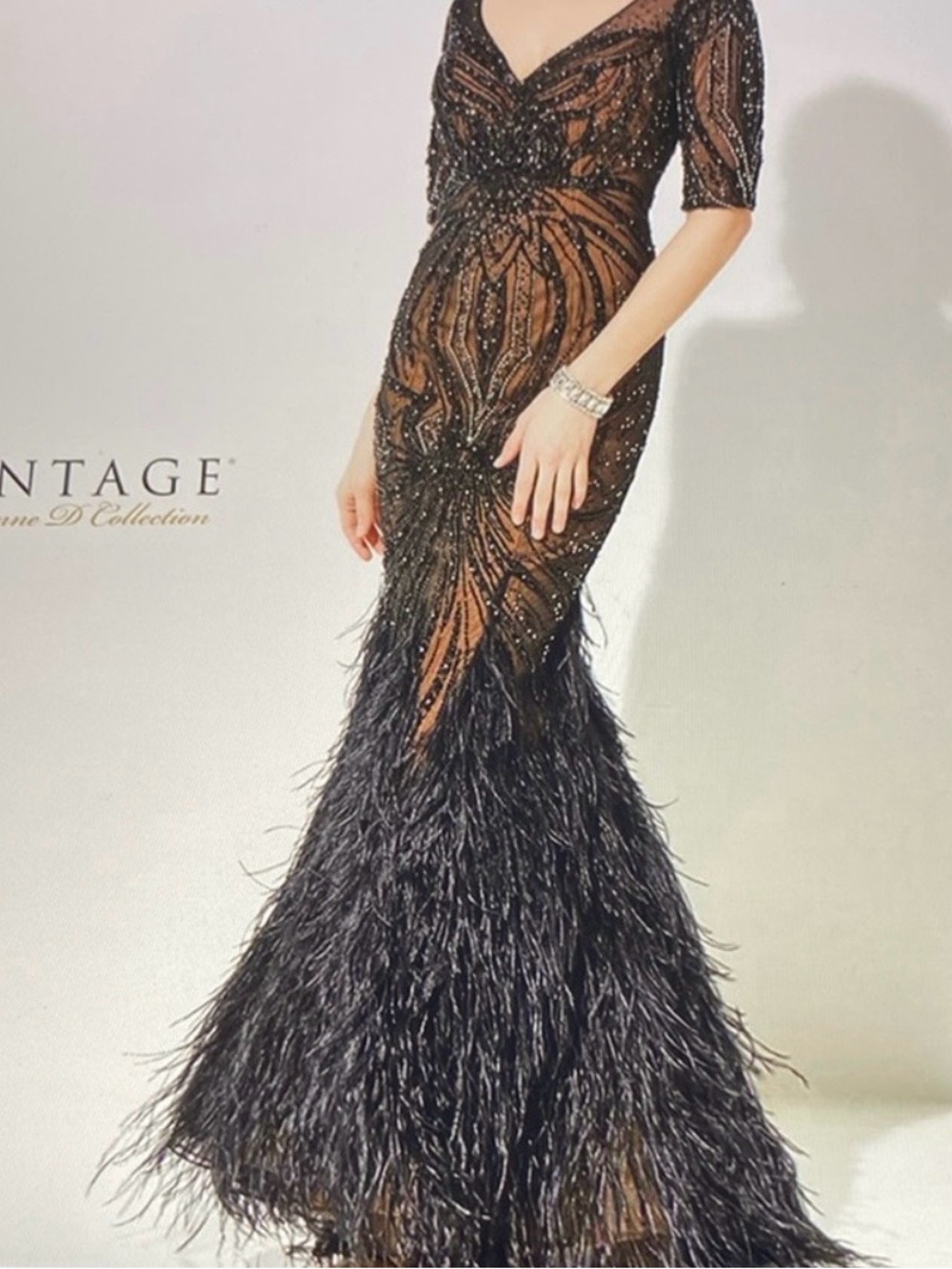 Ivonne D black and nude gown by montage 
size 14